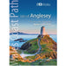 Book cover of 'Isle of Anglesey - top 10 walks' with a lighthouse and coastal path on the cover.