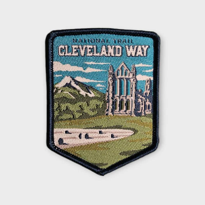 Embroidered patch of Cleveland Way National Trail with scenic design on a light gray background