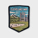 Embroidered patch of Cleveland Way National Trail with scenic design on a light gray background