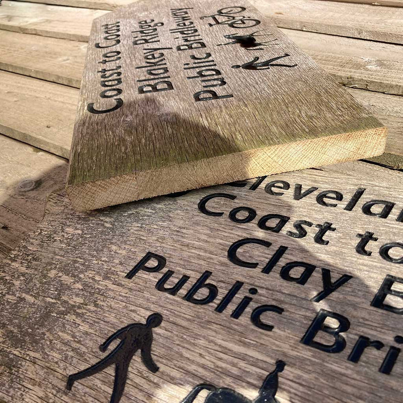 Close up of Coast to Coast National Trail signs