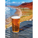 Book cover of 'Coastal Pub Walks South Wales' with a glass of beer on a table and scenic background.