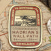 Hadrian's Wall Path fridge magnet on a vintage map background