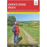 Book cover of Offa's Dyke Path guidebook with a person walking on a path and green fields.