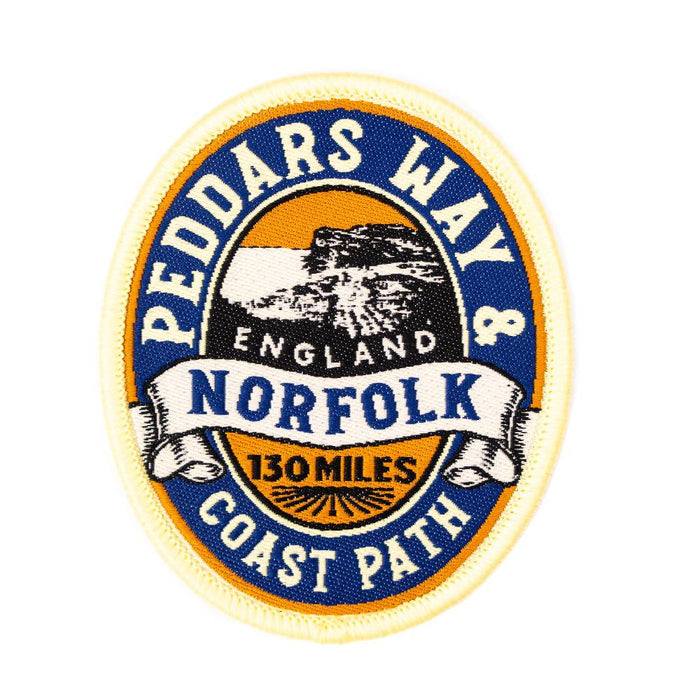 Peddar's Way and Norfolk Coast Path badge with scenic illustration on a blue background.