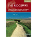 Book cover of 'The Ridgeway' guidebook by Cicerone with a path and landscape on a red background