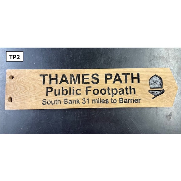 Wooden sign for Thames Path Public Footpath 